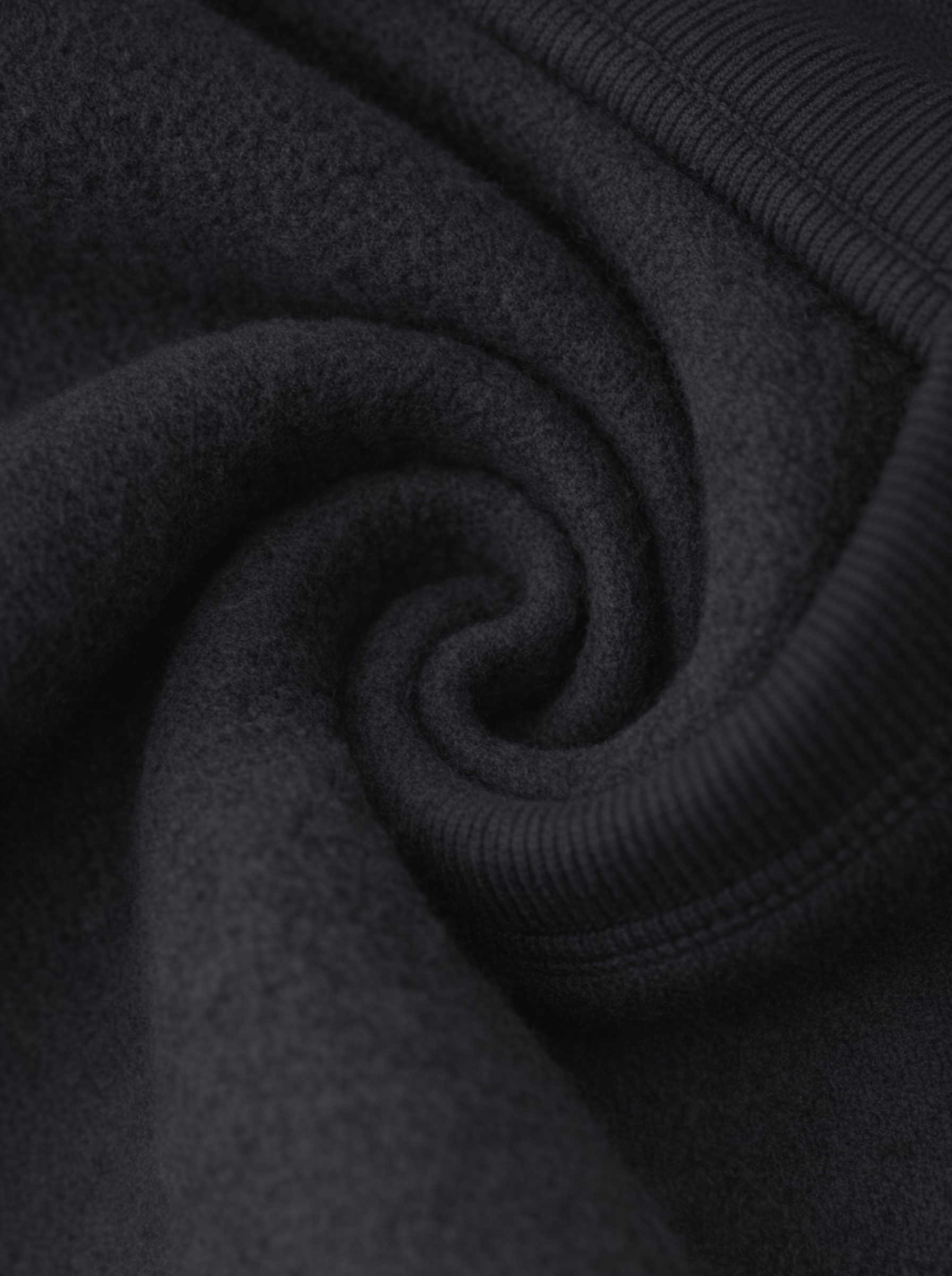 Close-up of dark black fabric fleece